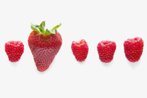 Four raspberries and one strawberry