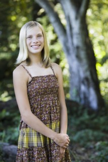 Young girl standing outside
