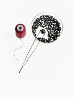 Tweezers thread and pearls