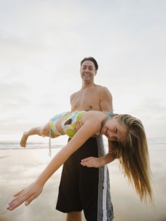 Man holding girl