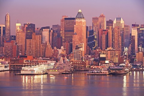 Waterfront buildings at sunset
