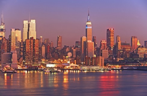 Waterfront buildings at sunset