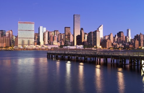 Waterfront cityscape at night