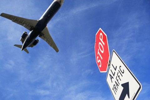 Airplane and traffic sign