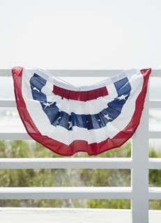 American flag decoration on fence