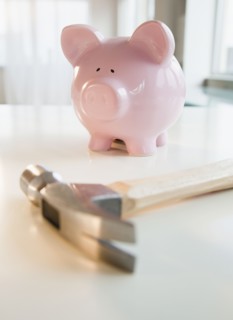 Hammer and piggy bank