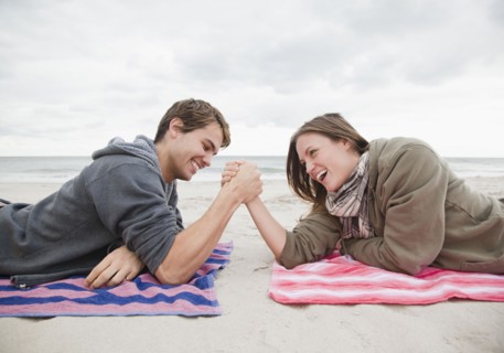 Couple arm wrestling