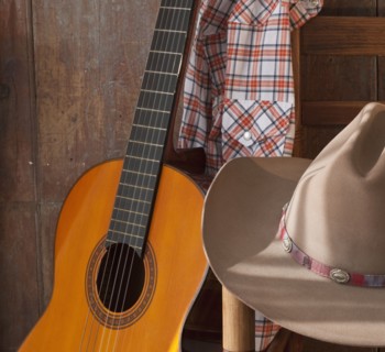 Cowboy hat and guitar.