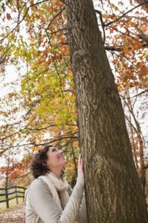 Woman looking at tree.