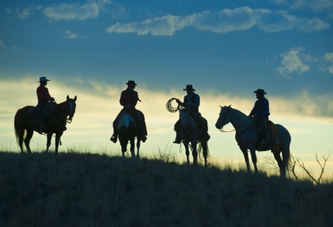 Horseback riders.