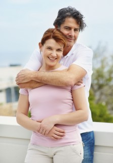 Man embracing woman. Photographer: momentimages