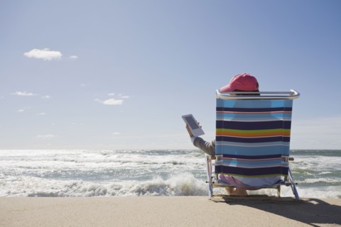 Reading at the beach. Photographer: Chris Hackett