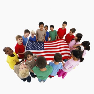 Children holding flag. Photographer: momentimages