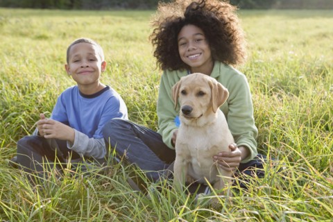 Children and dog. Photographer: Pauline St.Denis