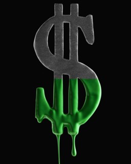 American dollar symbol dripping green paint. Photographer: Mike Kemp
