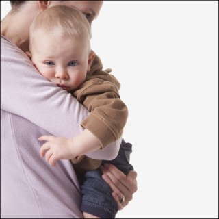 Mother and son embrace. Photographer: Mike Kemp