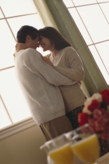 Couple embracing. Photographer: Rob Lewine