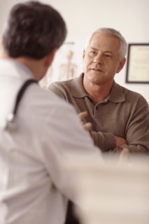 Doctor talking to patient. Photographer: Rob Lewine