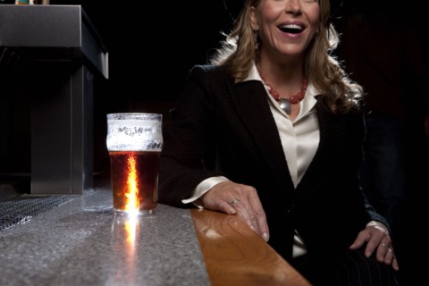 Woman at bar. Photographer: Dan Bannister