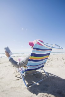 Reading at the beach. Photographer: Chris Hackett