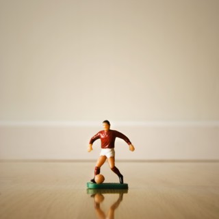 Figurine of a soccer player. Photographer: Joe Clark