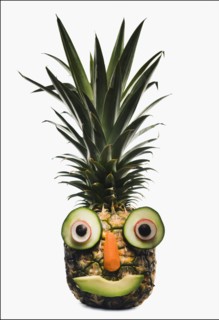 Pineapple with a happy face. Photographer: Mike Kemp
