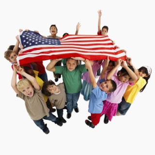 Children holding flag. Photographer: momentimages