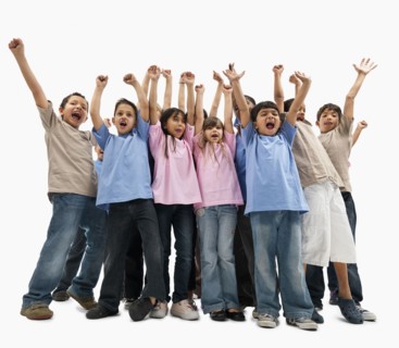 Children raising their arms. Photographer: momentimages