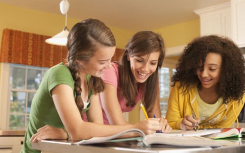 Friends doing homework. Photographer: mark edward atkinson