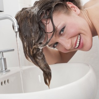 Woman washing hair.