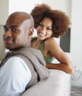 Couple on couch. Photographer: momentimages