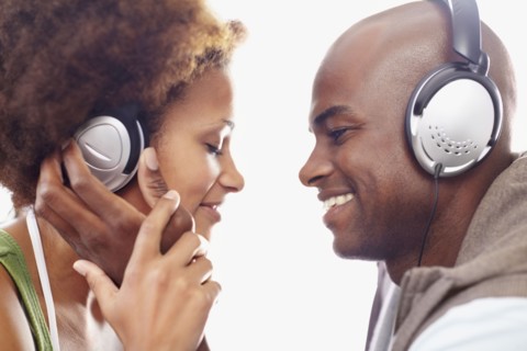 Couple wearing headphones. Photographer: momentimages