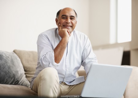 Man working on laptop. Photographer: momentimages