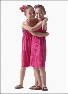 Twins embrace. Photographer: Mike Kemp