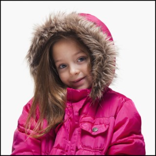 Young girl wearing winter clothing. Photographer: Mike Kemp