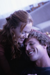 Couple embracing. Photographer: Rob Lewine