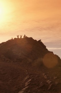 Mountain bikers on mountain peak. Photographer: Dan Bannister