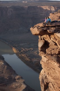 Hikers at top of cliff. Photographer: Dan Bannister