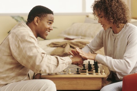 Couple playing chess. Photographer: Rob Lewine