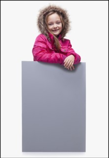 Young girl wearing winter coat. Photographer: Mike Kemp