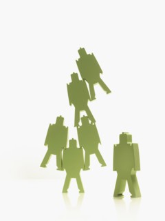 Green paper people. Photographer: David Arky