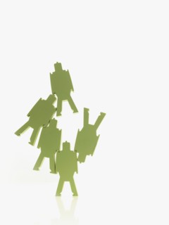 Green paper people. Photographer: David Arky