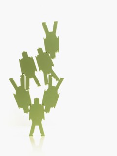 Green paper people. Photographer: David Arky