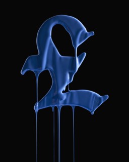 British pound symbol covered in blue paint. Photographer: Mike Kemp