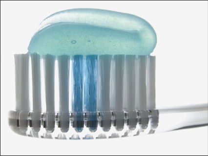 Toothbrush and toothpaste. Photographer: Mike Kemp