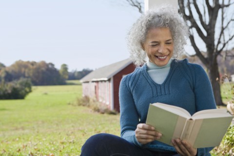 Woman reading a book. Photographer: Pauline St.Denis