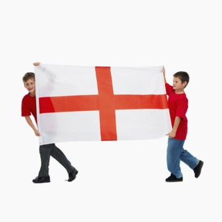 Two boys carrying flag. Photographer: momentimages