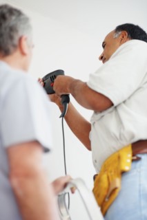 Man drilling. Photographer: momentimages
