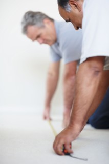 Measuring floor. Photographer: momentimages