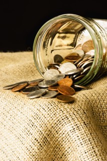 Coins in a jar. Photographer: Joe Clark
